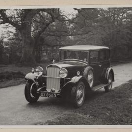 [Woman in motor vehicle]