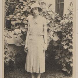 [Mabel posed in front of Hydrangea, Miegunyah]