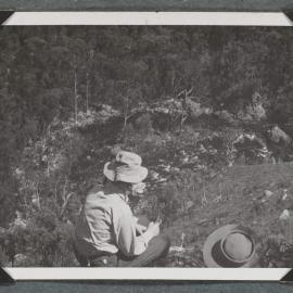 [Mountaineering Club Tasmania trip - woman seated in a foreground]