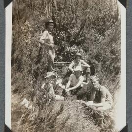 [Mountaineering Club Tasmania trip - five people seated]